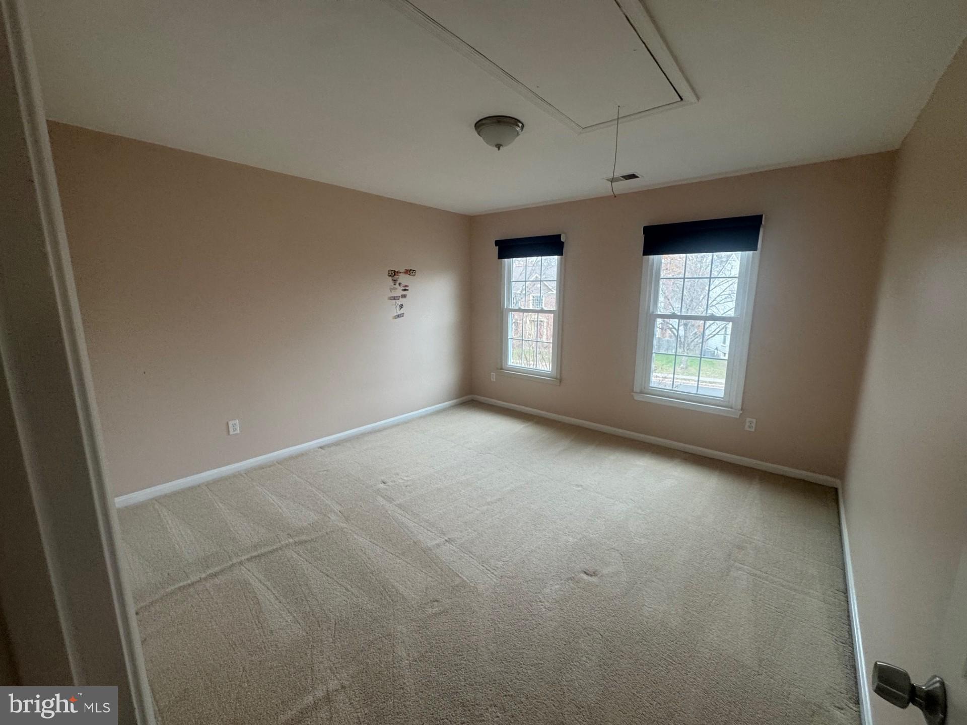 8143 Ridge Creek Way Springfield, VA 22153 - Photo 29 of 42 an empty room with windows