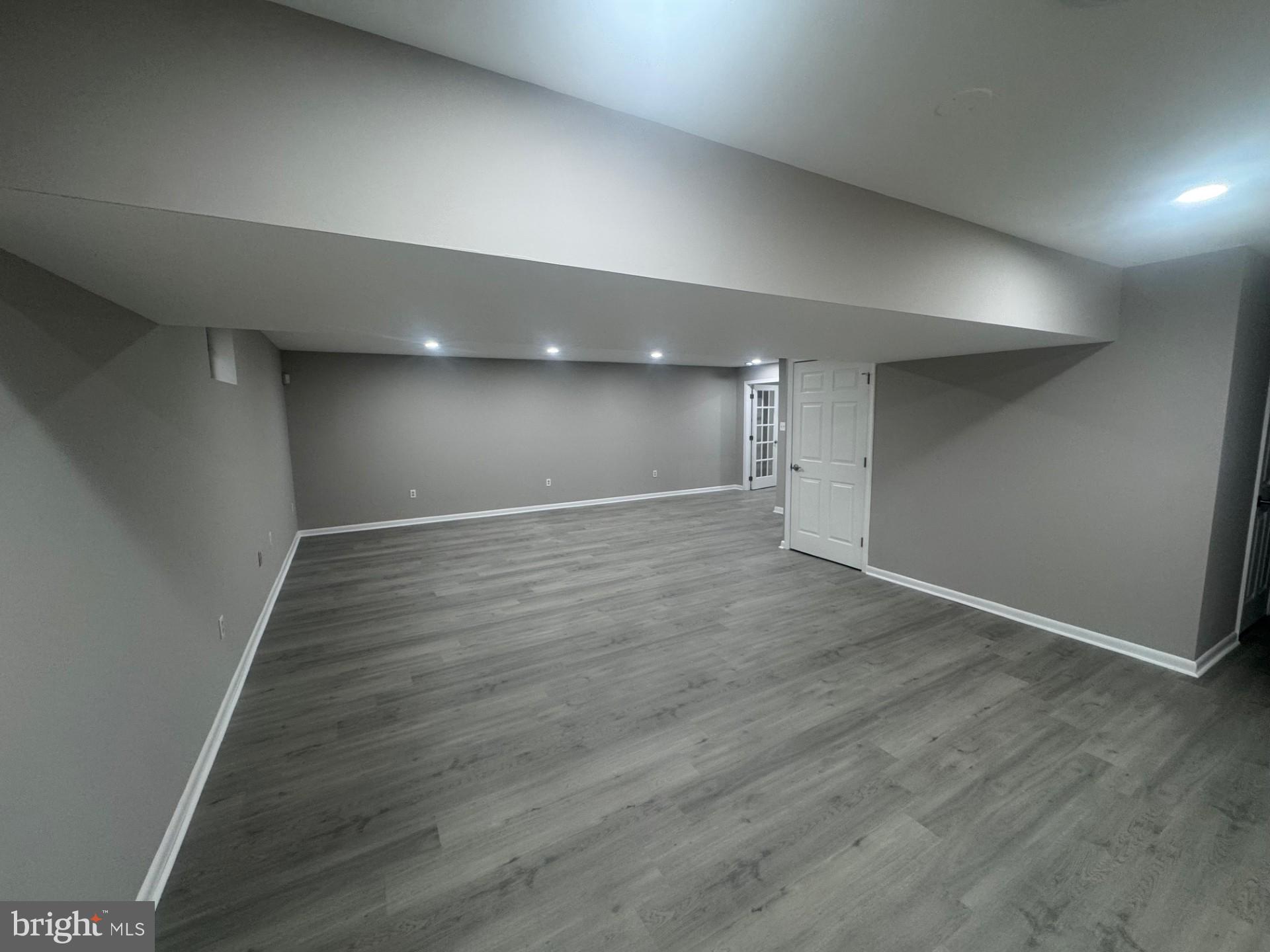 8143 Ridge Creek Way Springfield, VA 22153 - Photo 32 of 42 wooden floor in an empty room with wooden floor