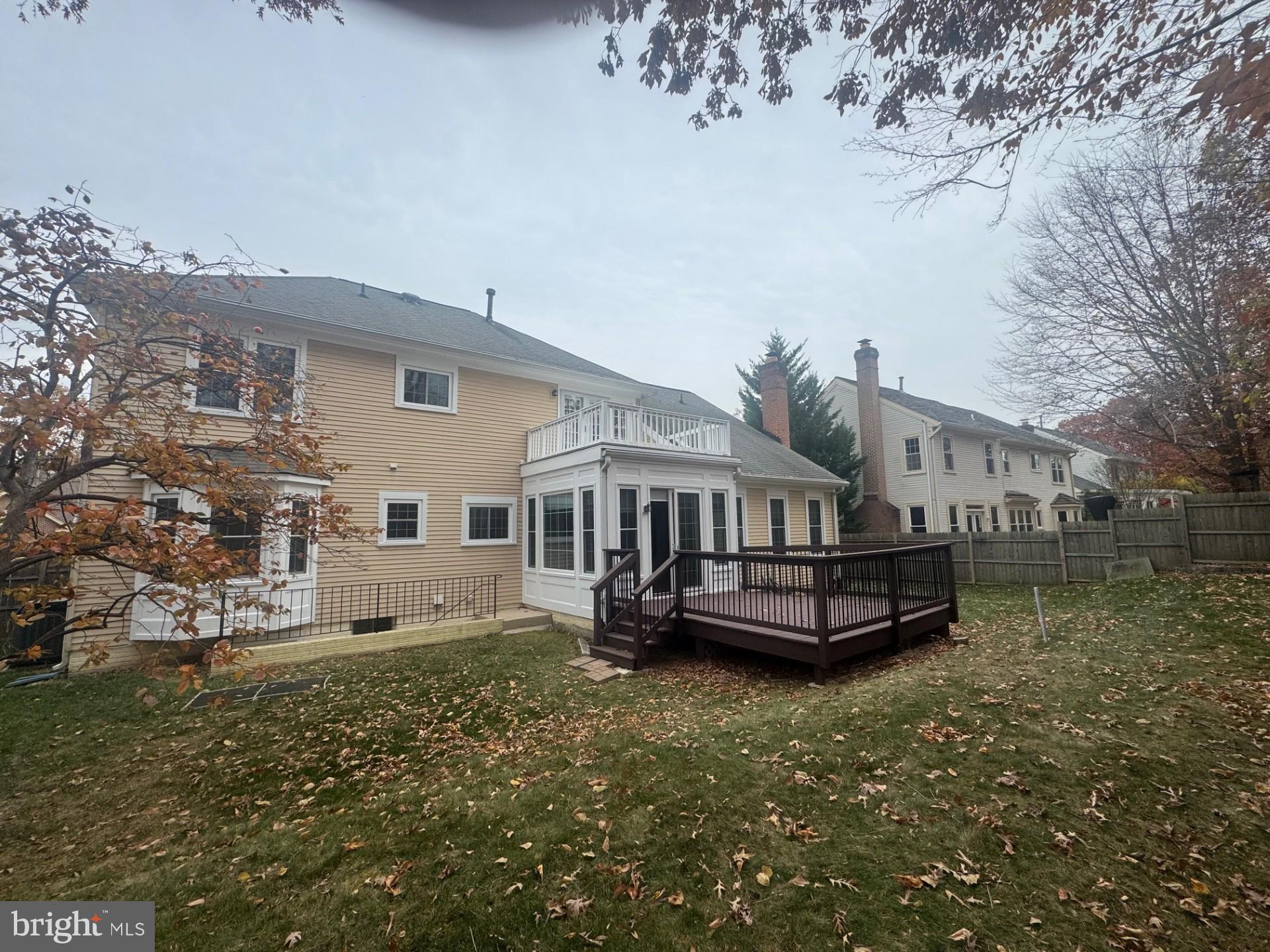 8143 Ridge Creek Way Springfield, VA 22153 - Photo 42 of 42 a front view of a house with a garden