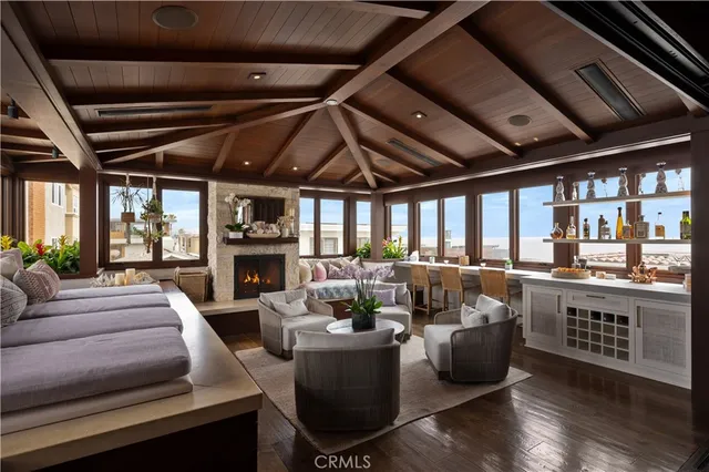 a kitchen with stainless steel appliances granite countertop a sink a stove and cabinets