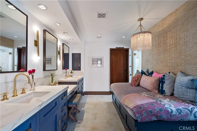 a bedroom with a bed and dresser