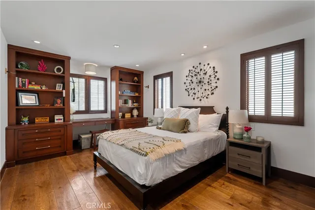 a living room with furniture a dining table and chairs