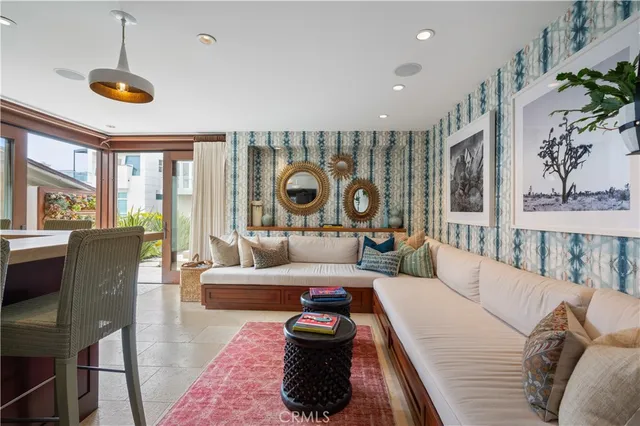 a room with lots of chairs and mirrors