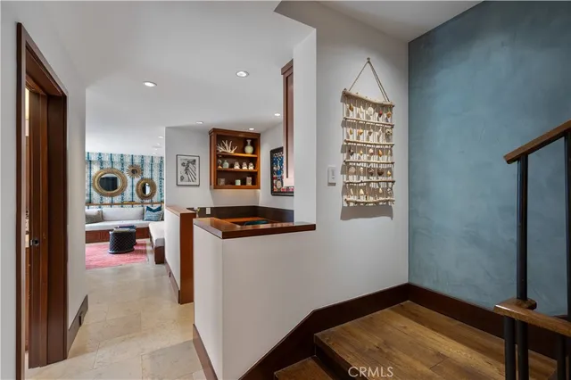 a kitchen that has a sink and a stove in it