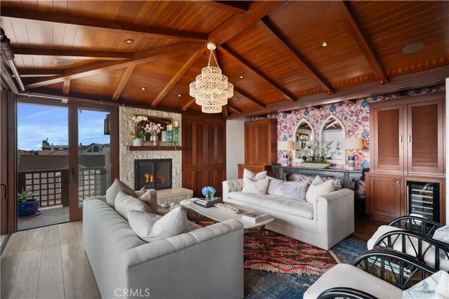 a living room with furniture and a clock