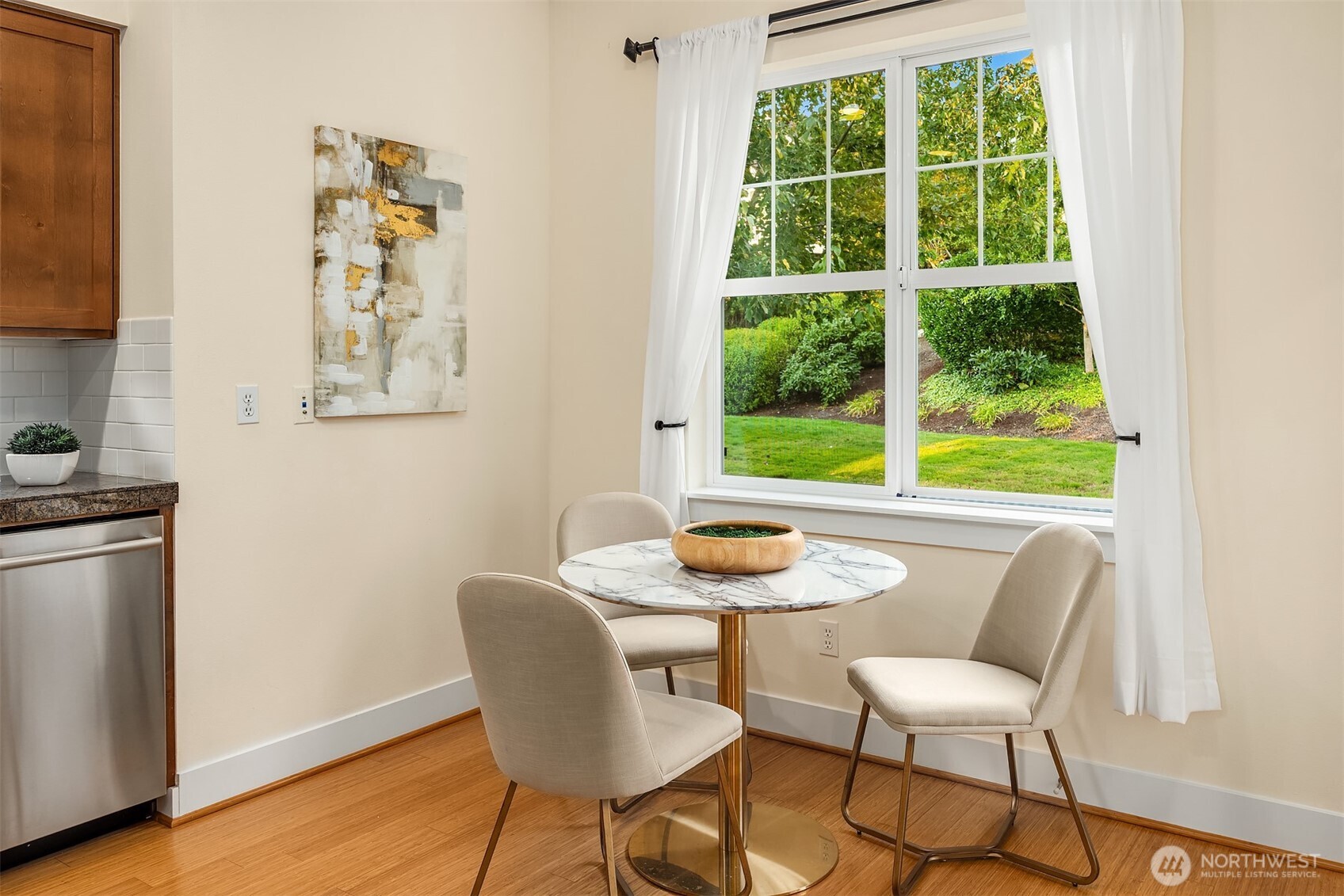 1748 25th Walk Northeast Issaquah, WA 98029 - Photo 16 of 40 a dining room with furniture and a window