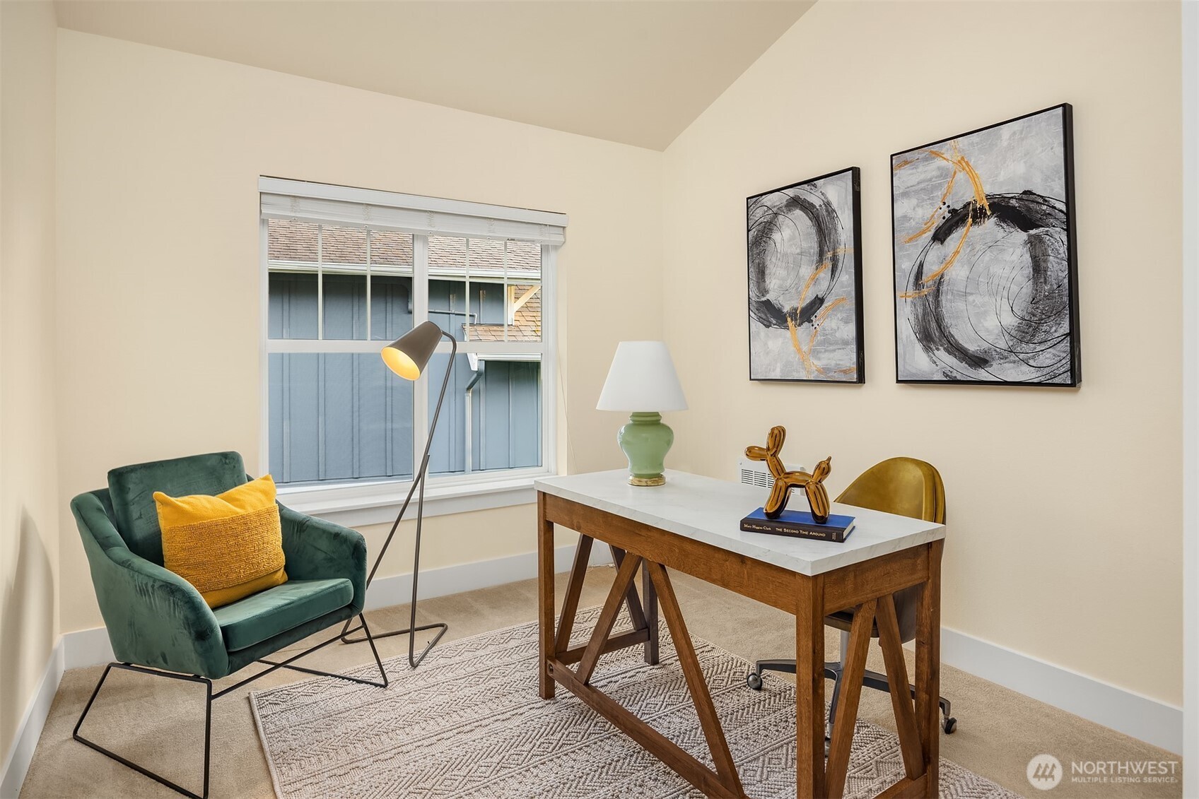 1748 25th Walk Northeast Issaquah, WA 98029 - Photo 20 of 40 a view of a workspace area with furniture and wooden floor