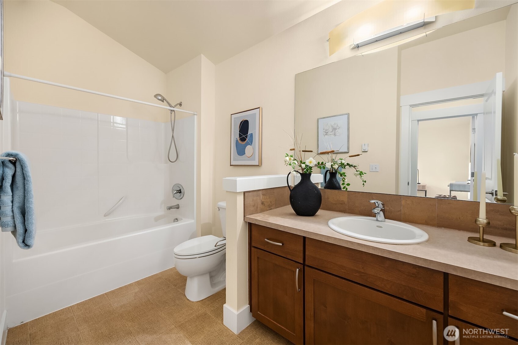 1748 25th Walk Northeast Issaquah, WA 98029 - Photo 23 of 40 a bathroom with a granite countertop sink a toilet and shower