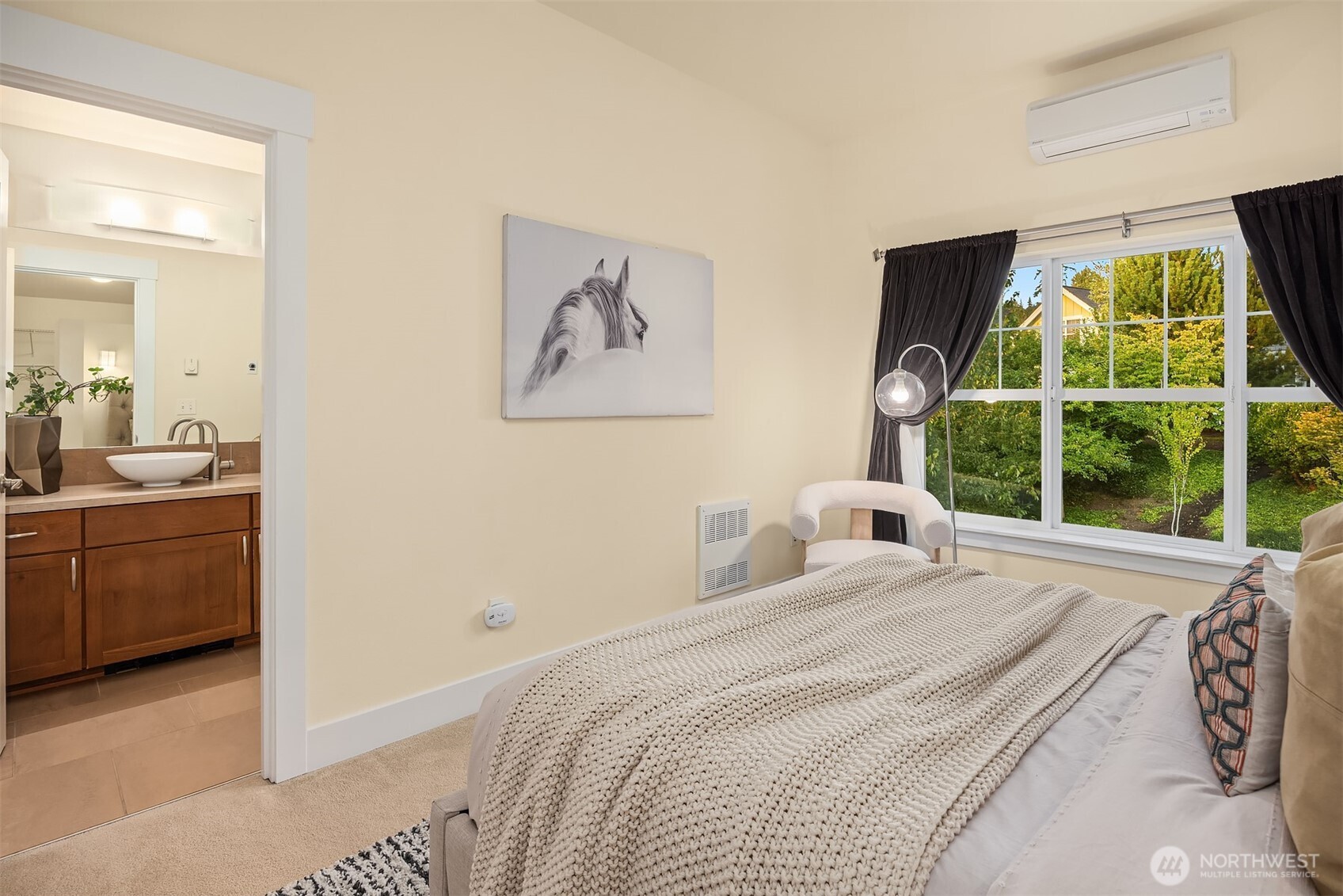 1748 25th Walk Northeast Issaquah, WA 98029 - Photo 26 of 40 a bedroom with a bed and a large window