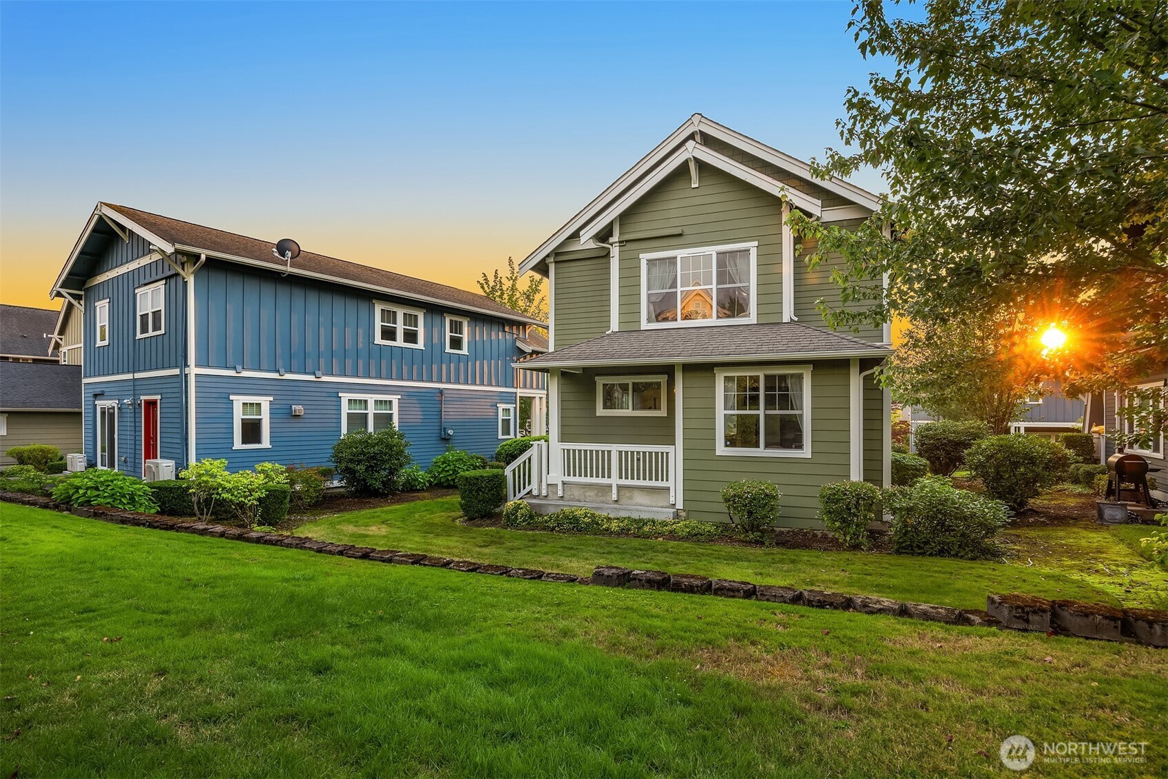 1748 25th Walk Northeast Issaquah, WA 98029 - Photo 33 of 40 a front view of a house with a yard and trees