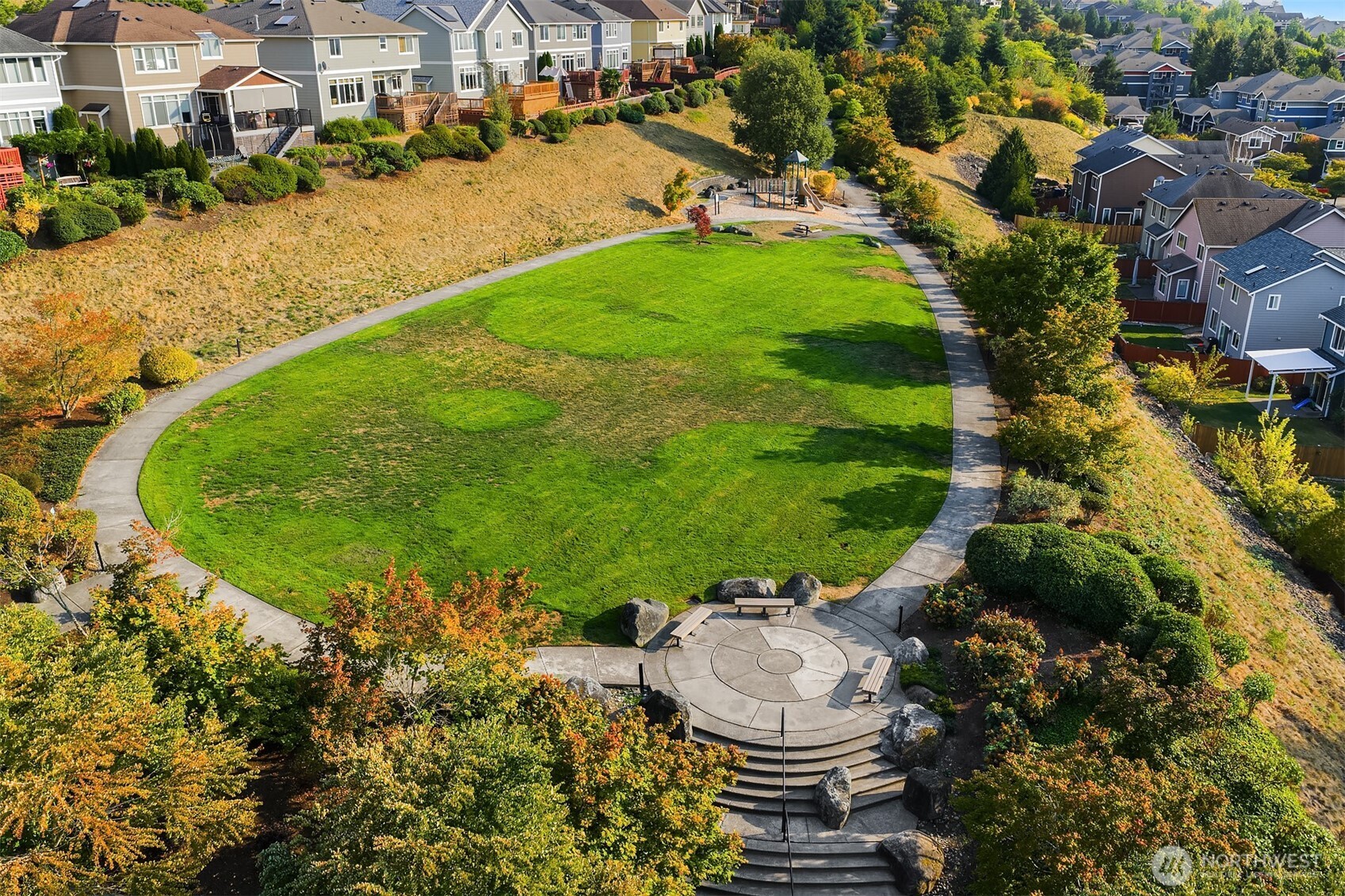 1748 25th Walk Northeast Issaquah, WA 98029 - Photo 38 of 40 a view of a swimming pool with a yard and plants