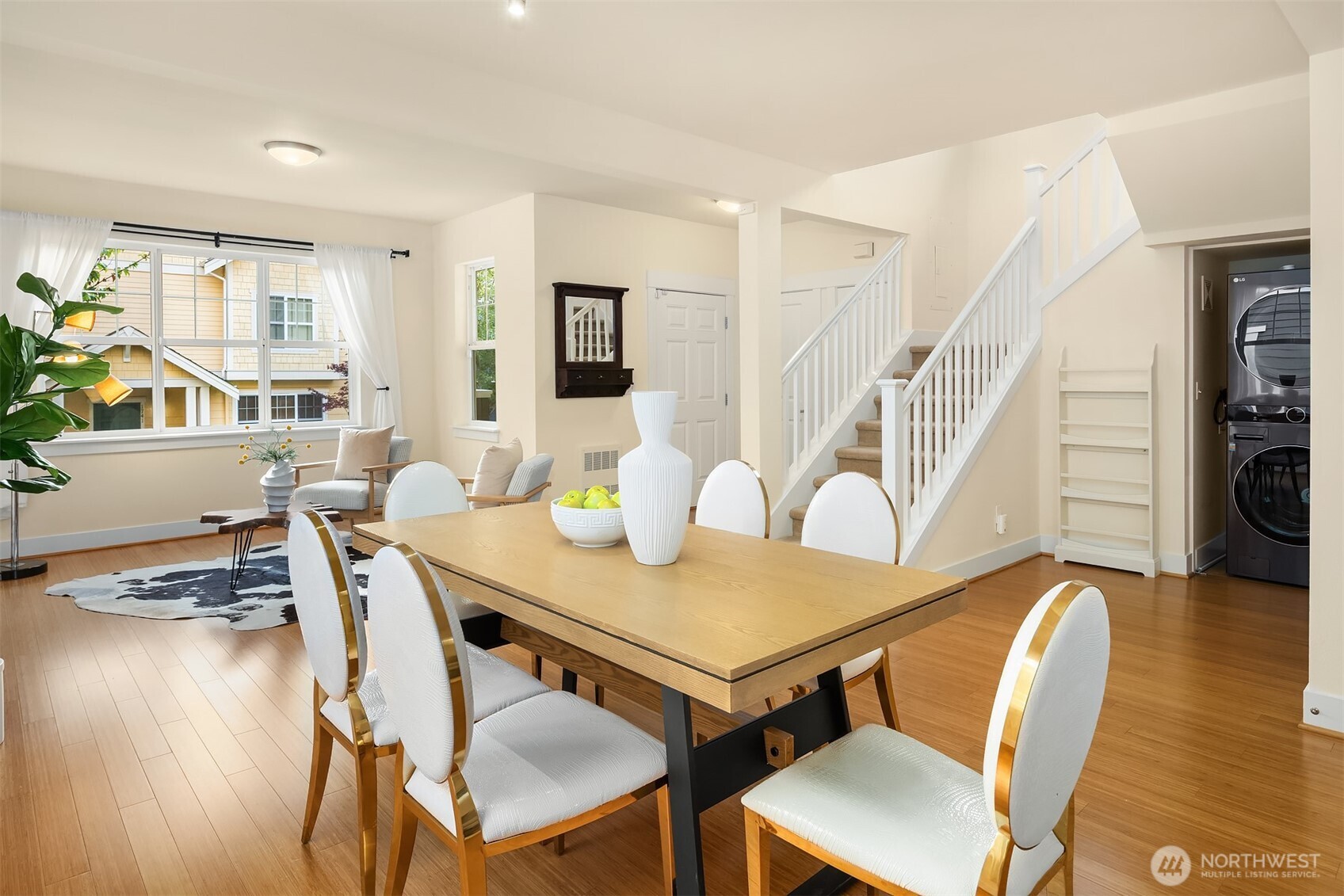 1748 25th Walk Northeast Issaquah, WA 98029 - Photo 9 of 40 a view of a dining room with furniture and wooden floor