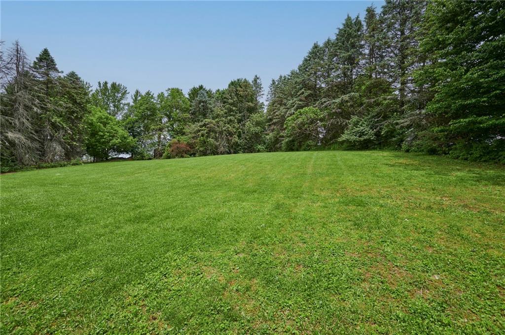 122 Springhouse Drive Butler, PA 16001 - Photo 33 of 42 Tree-lined private back yard