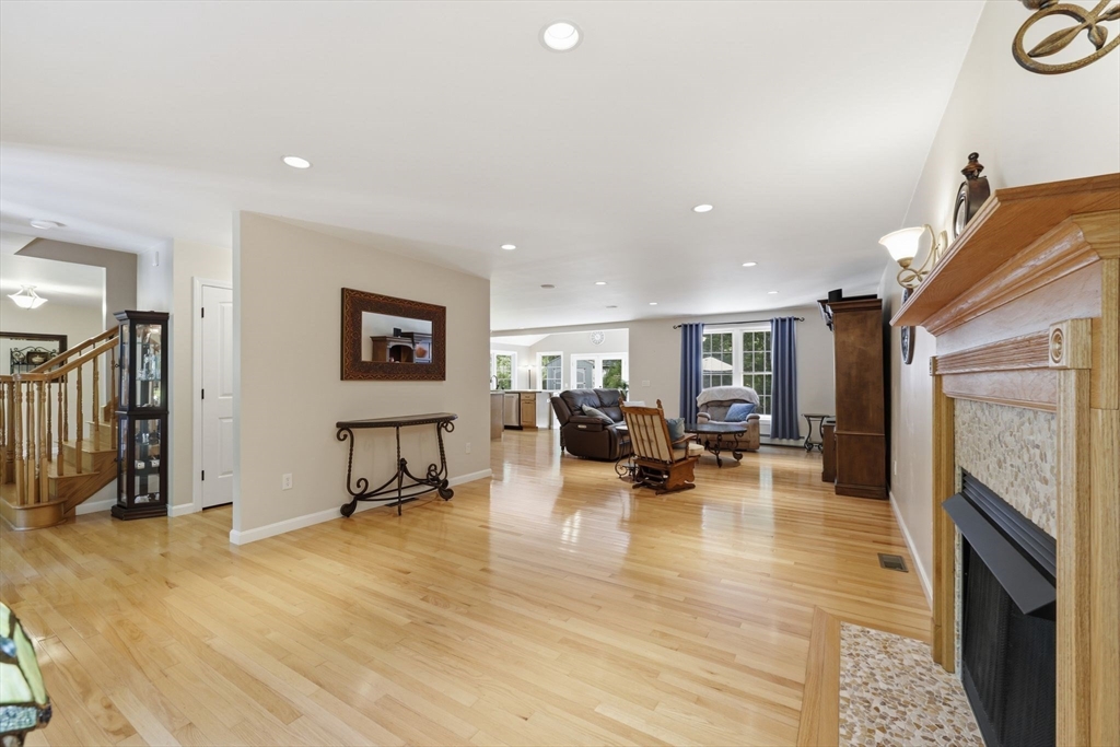 345 Bragg Road Warren, MA 01585 - Photo 8 of 41 a living room with furniture and a fireplace