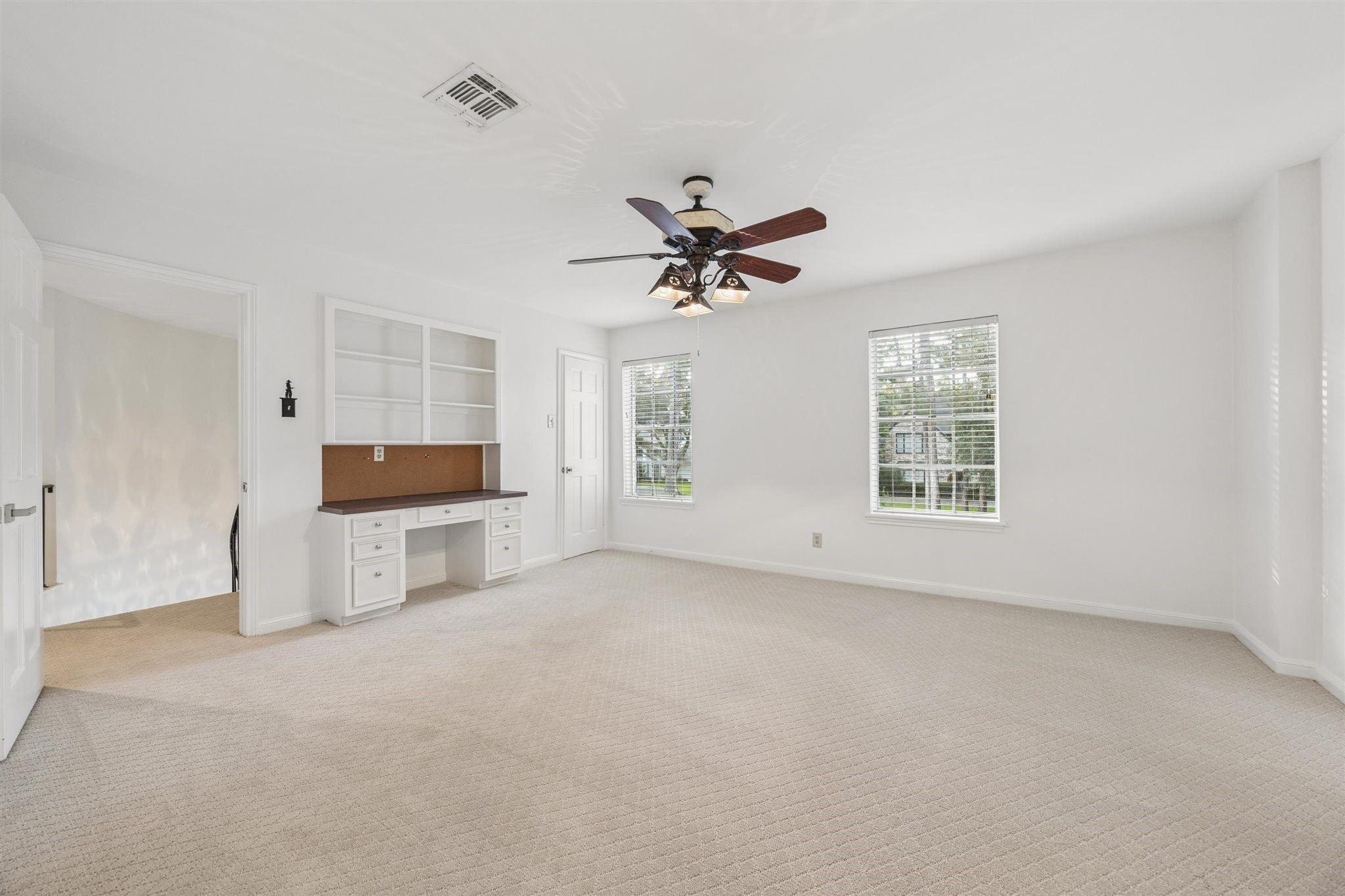 11903 Stoney Ridge Lane Houston, TX 77024 - Photo 28 of 44 Large secondary upstairs bedroom with built-ins and walk-in closet