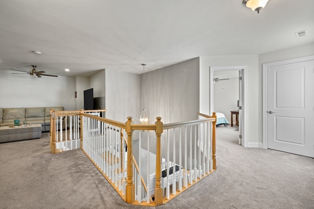 57 Phoebe Street, Unit 33 Methuen, MA 01844 - Photo 22 of 41 a view of a hallway with seating area