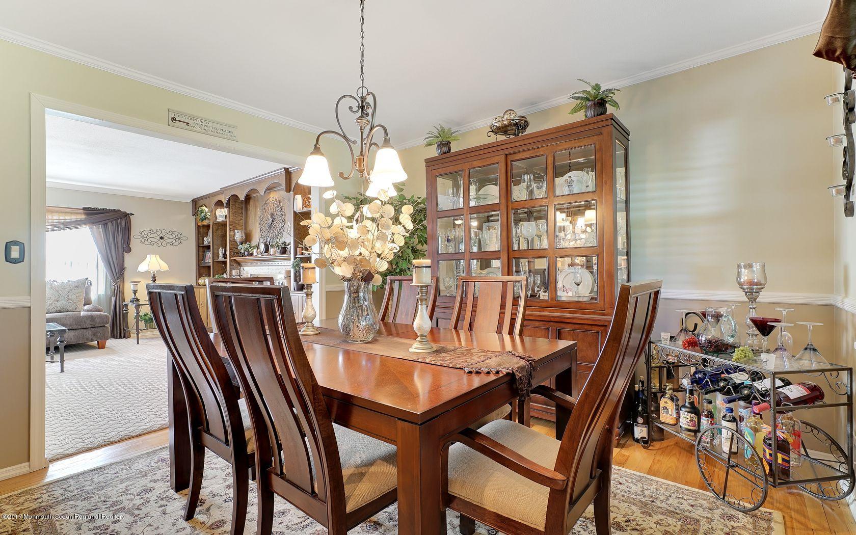 9 Cornwall Road Freehold, NJ 07728 - Photo 12 of 38 a view of a dining room with furniture window and outside view