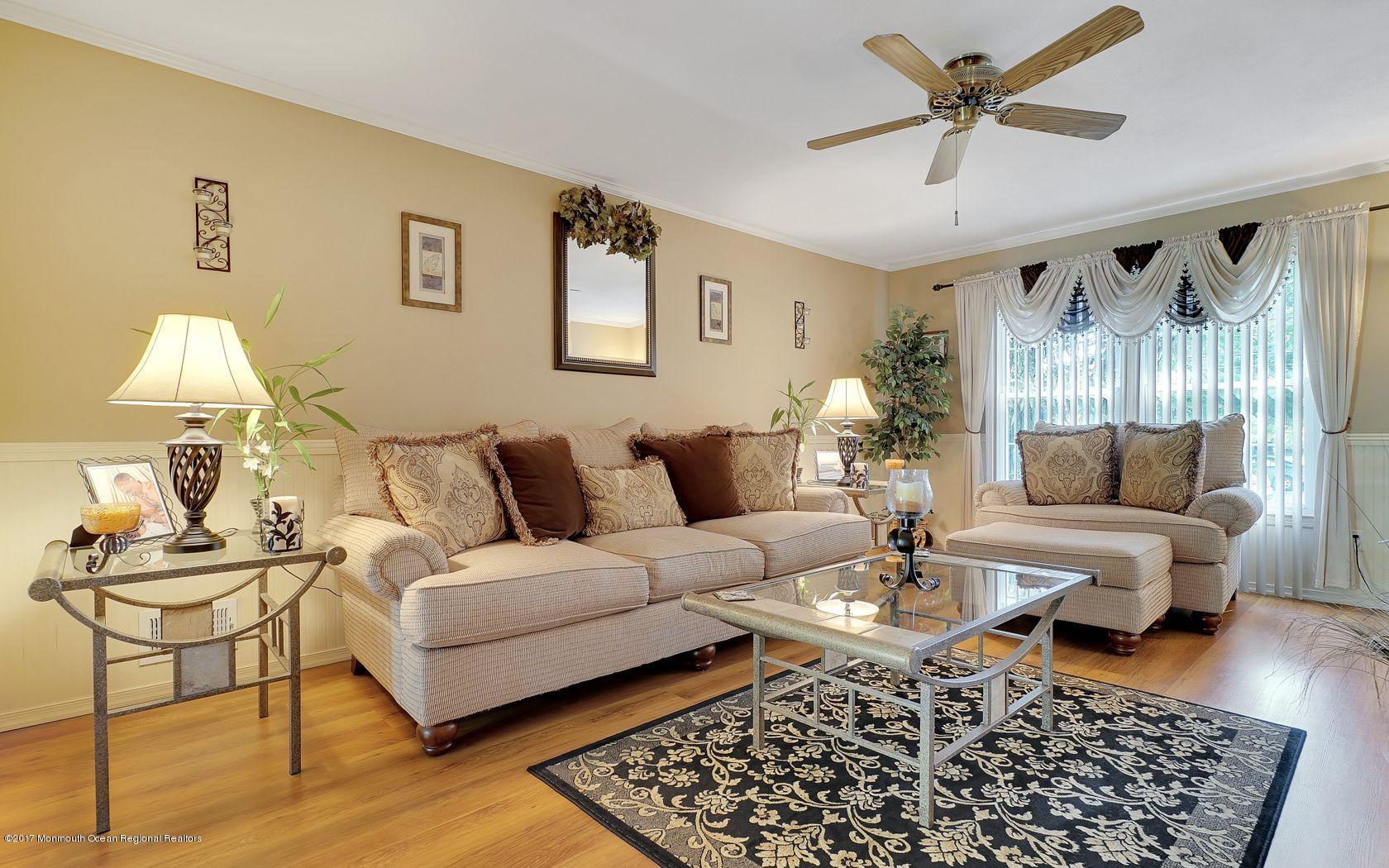 9 Cornwall Road Freehold, NJ 07728 - Photo 21 of 38 a living room with furniture and a rug
