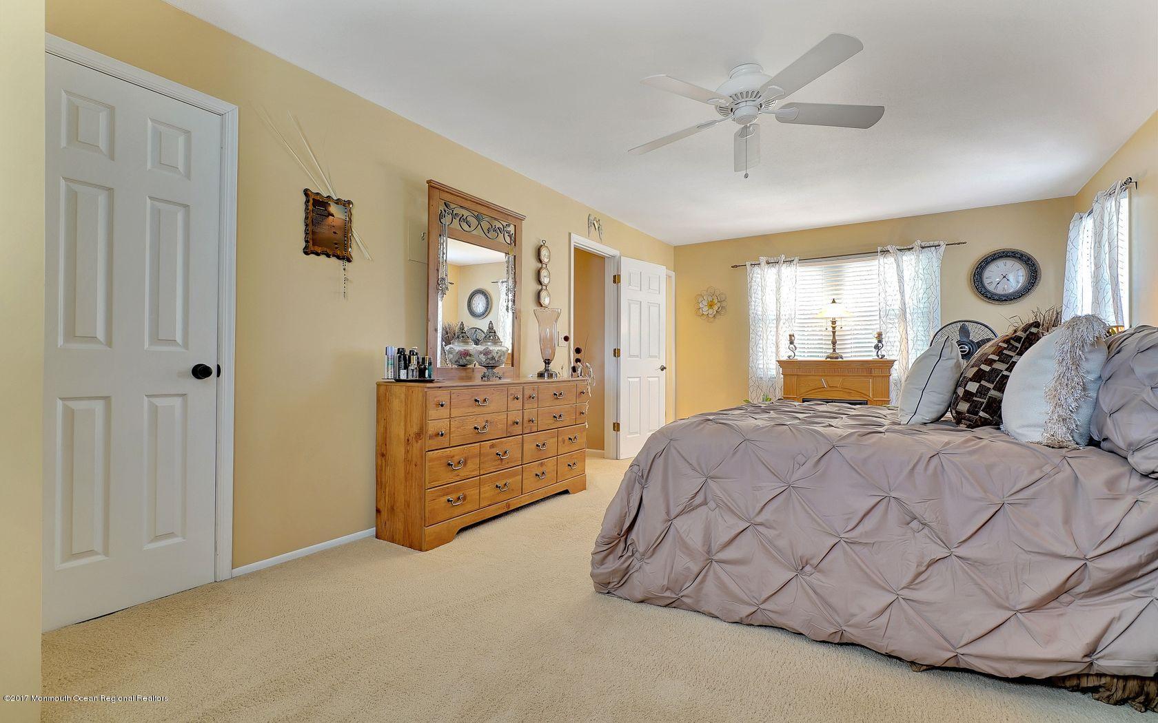 9 Cornwall Road Freehold, NJ 07728 - Photo 26 of 38 a bed room with a bed and a closet