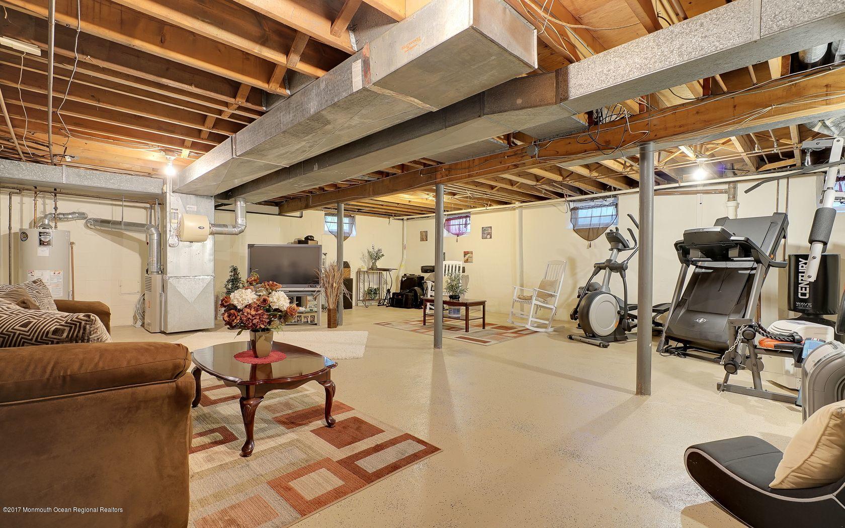 9 Cornwall Road Freehold, NJ 07728 - Photo 33 of 38 a view of a room with gym equipment