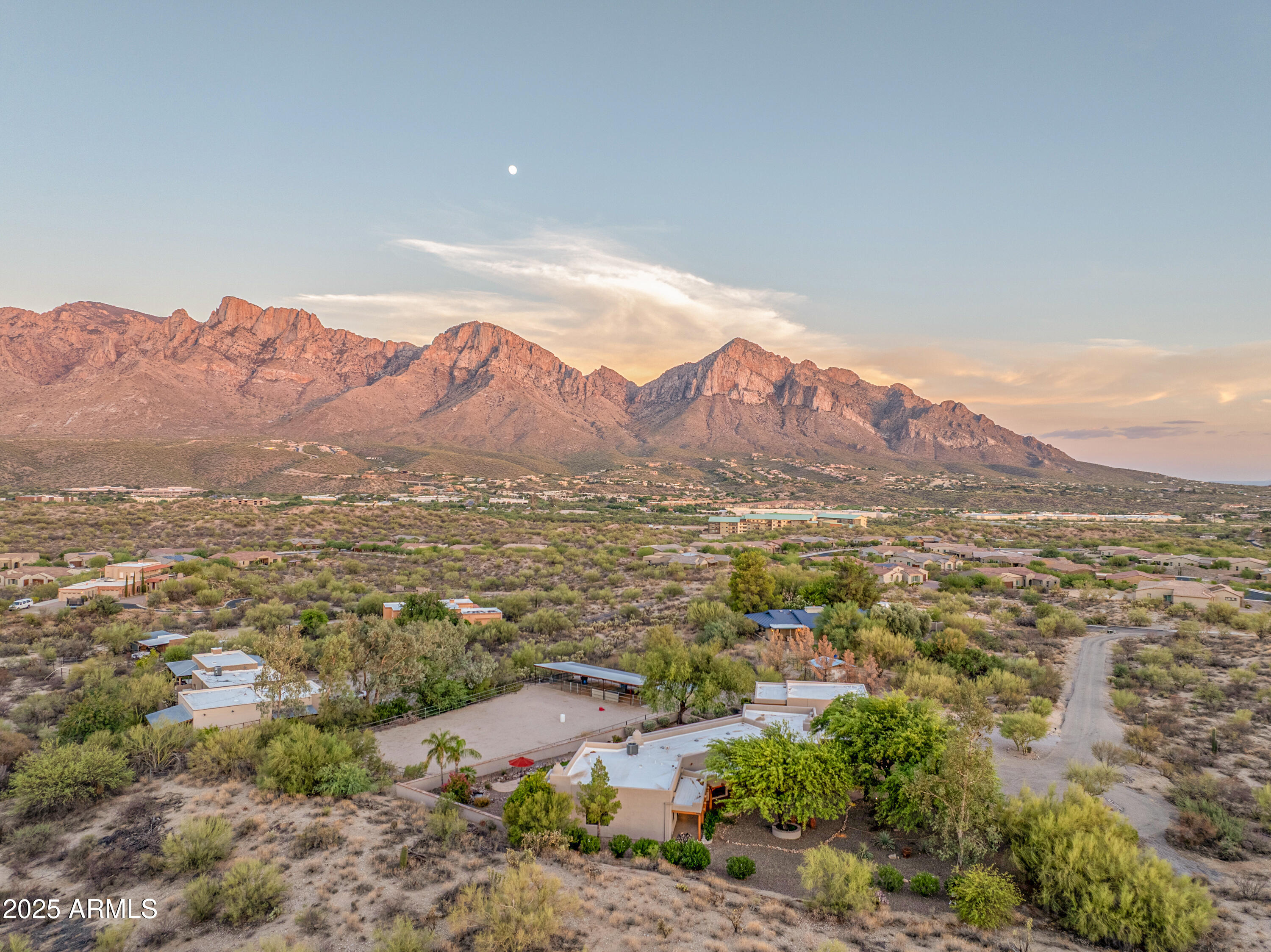 a view of a city with mountains in the background