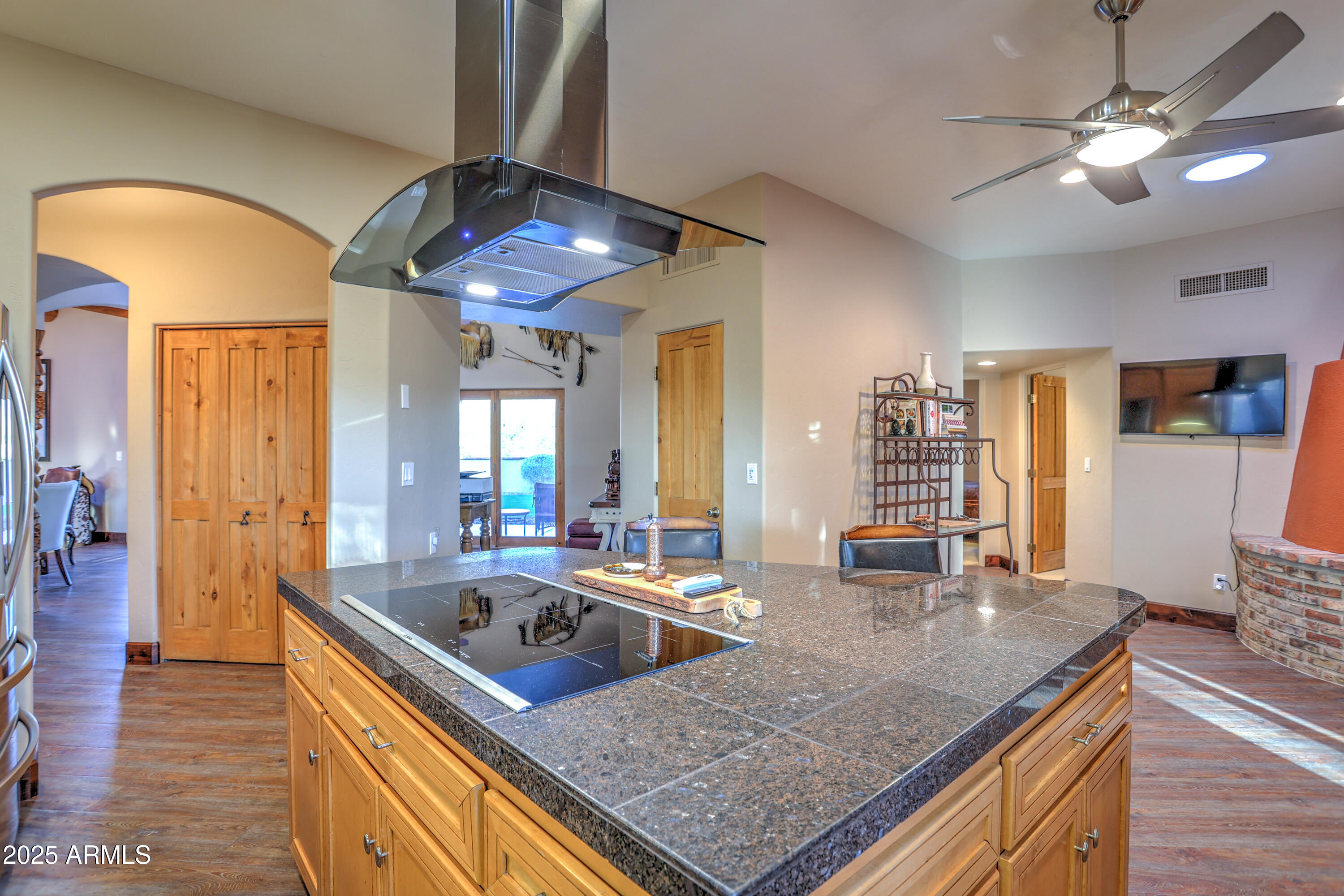 11484 North 1st Avenue Tucson, AZ 85737 - Photo 22 of 47 a kitchen with stainless steel appliances granite countertop a sink a stove and a refrigerator