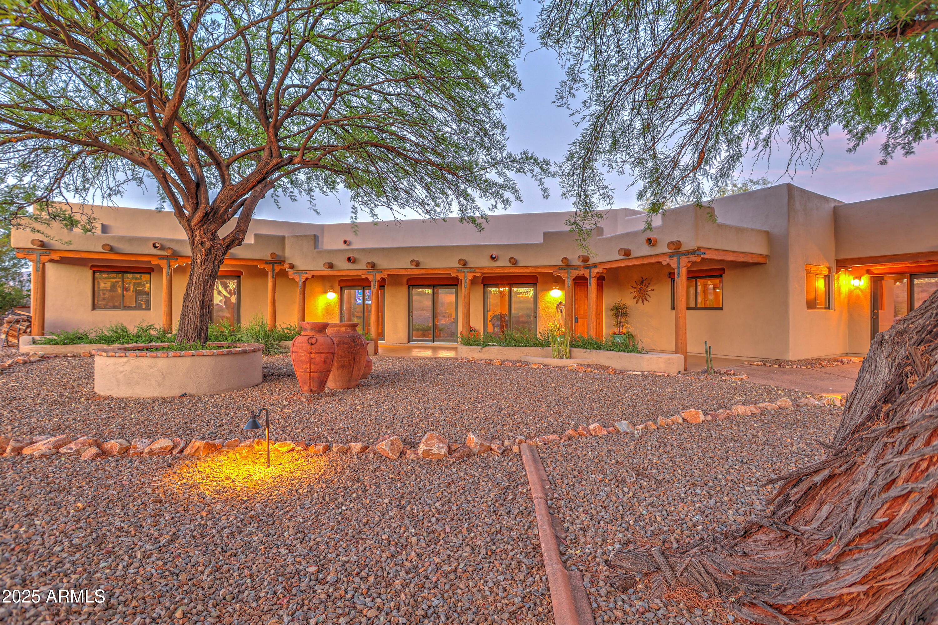 11484 North 1st Avenue Tucson, AZ 85737 - Photo 2 of 47 a view of a house with a yard