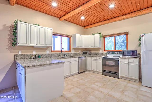 a bed room with furniture and wooden floor