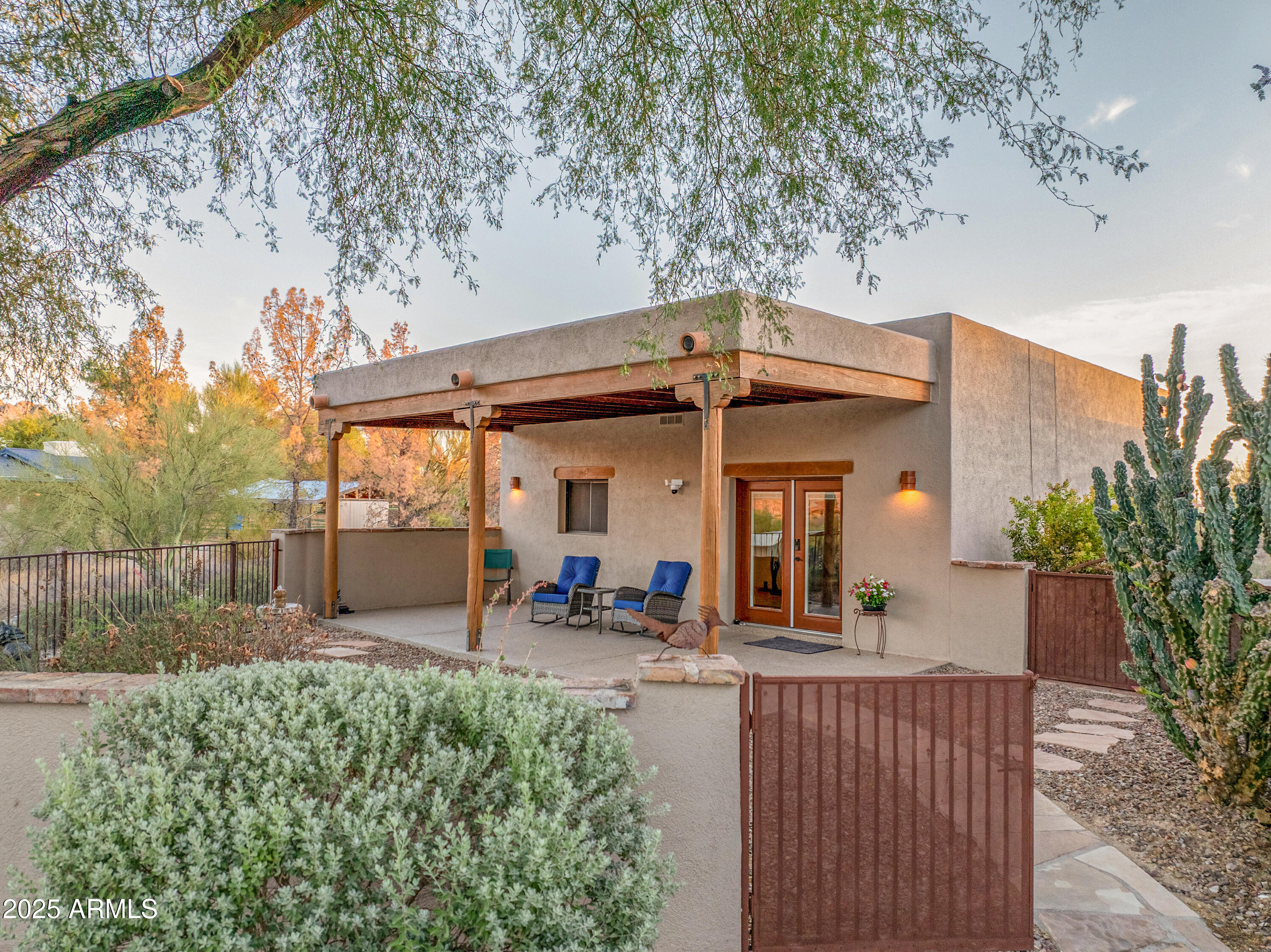 11484 North 1st Avenue Tucson, AZ 85737 - Photo 3 of 47 front view of a house with a porch