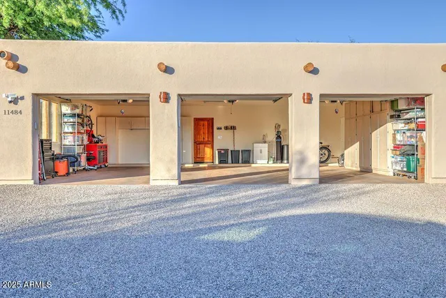 a room with pool table and furniture