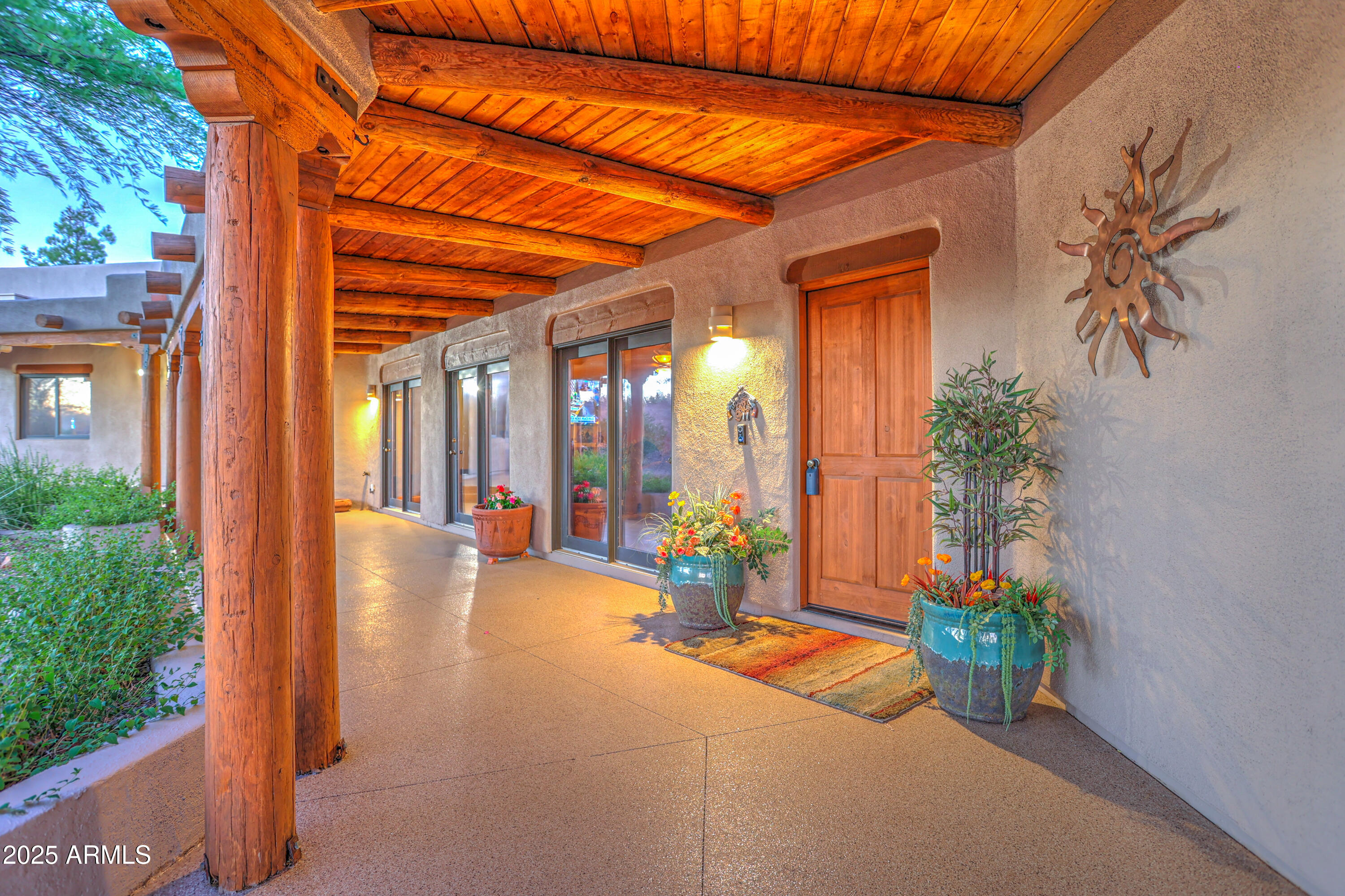 11484 North 1st Avenue Tucson, AZ 85737 - Photo 6 of 47 a view of a patio with a table and chairs under an umbrella