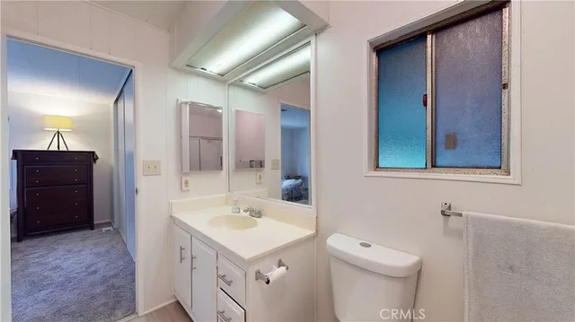 a bathroom with a sink and a toilet