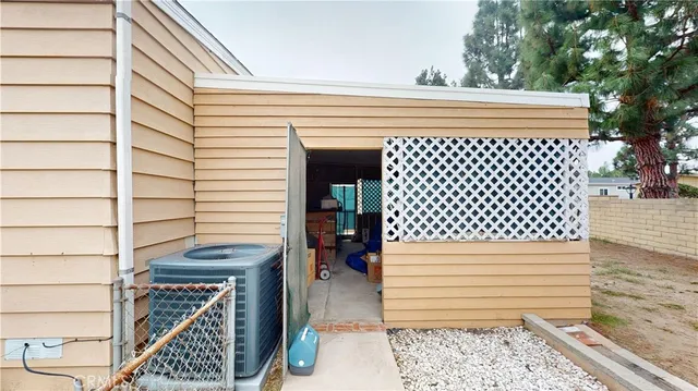 a view of a wooden door of the house