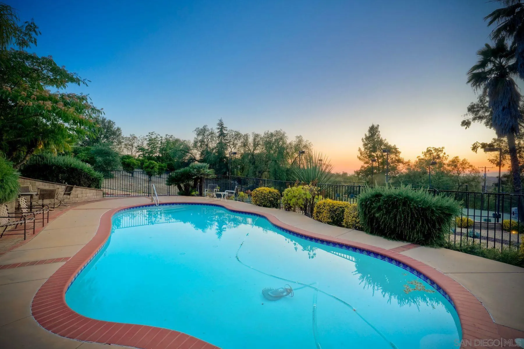 30458 Cool Valley Highlands Road Valley Center, CA 92082 - Photo 10 of 47 a view of a swimming pool with a yard