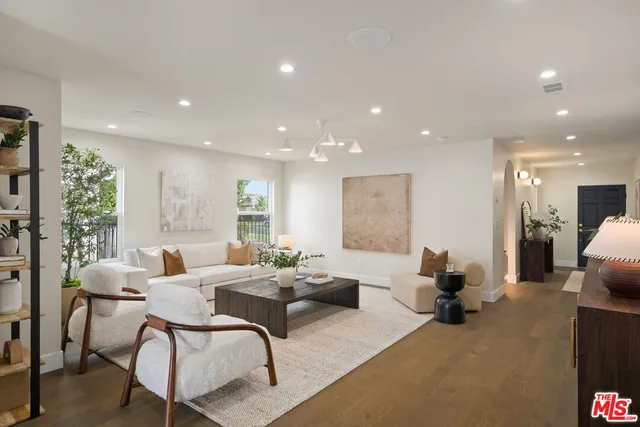 a kitchen with a table and chairs in it