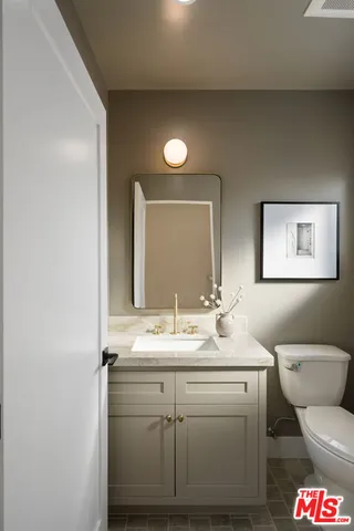 a room with walk in closet and window