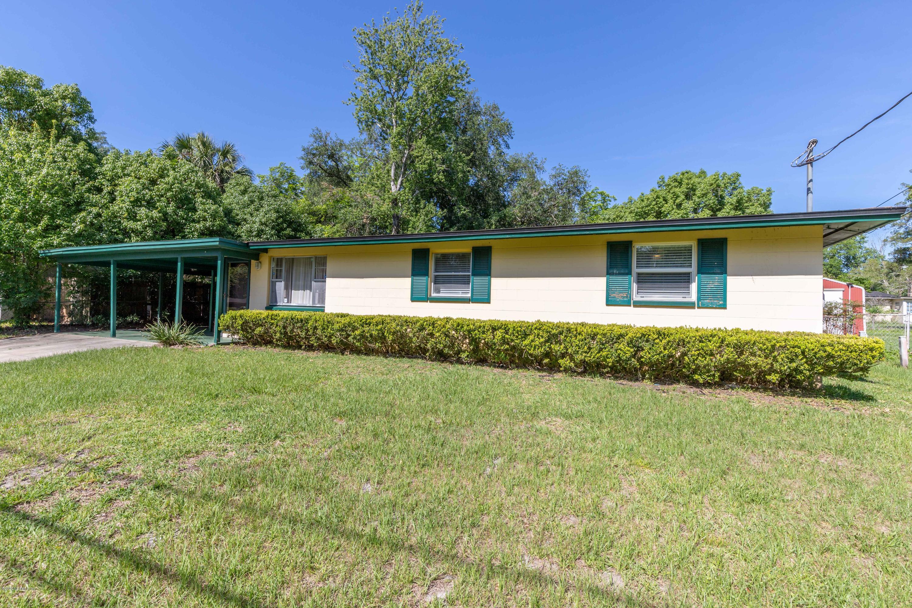 5908 Ensenada Road Jacksonville, FL 32244 - Photo 1 of 30 a house view with a garden space
