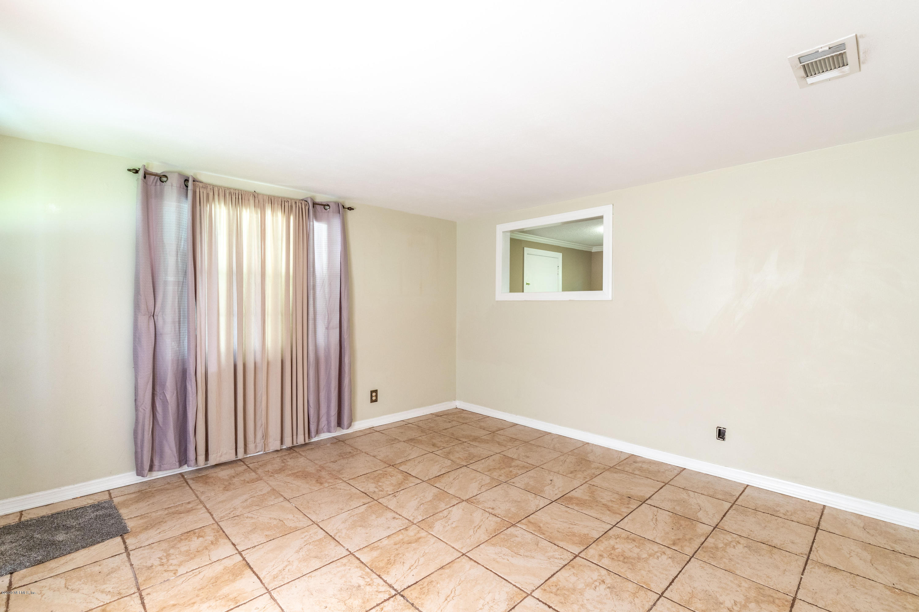 5908 Ensenada Road Jacksonville, FL 32244 - Photo 14 of 30 a view of a room with a window