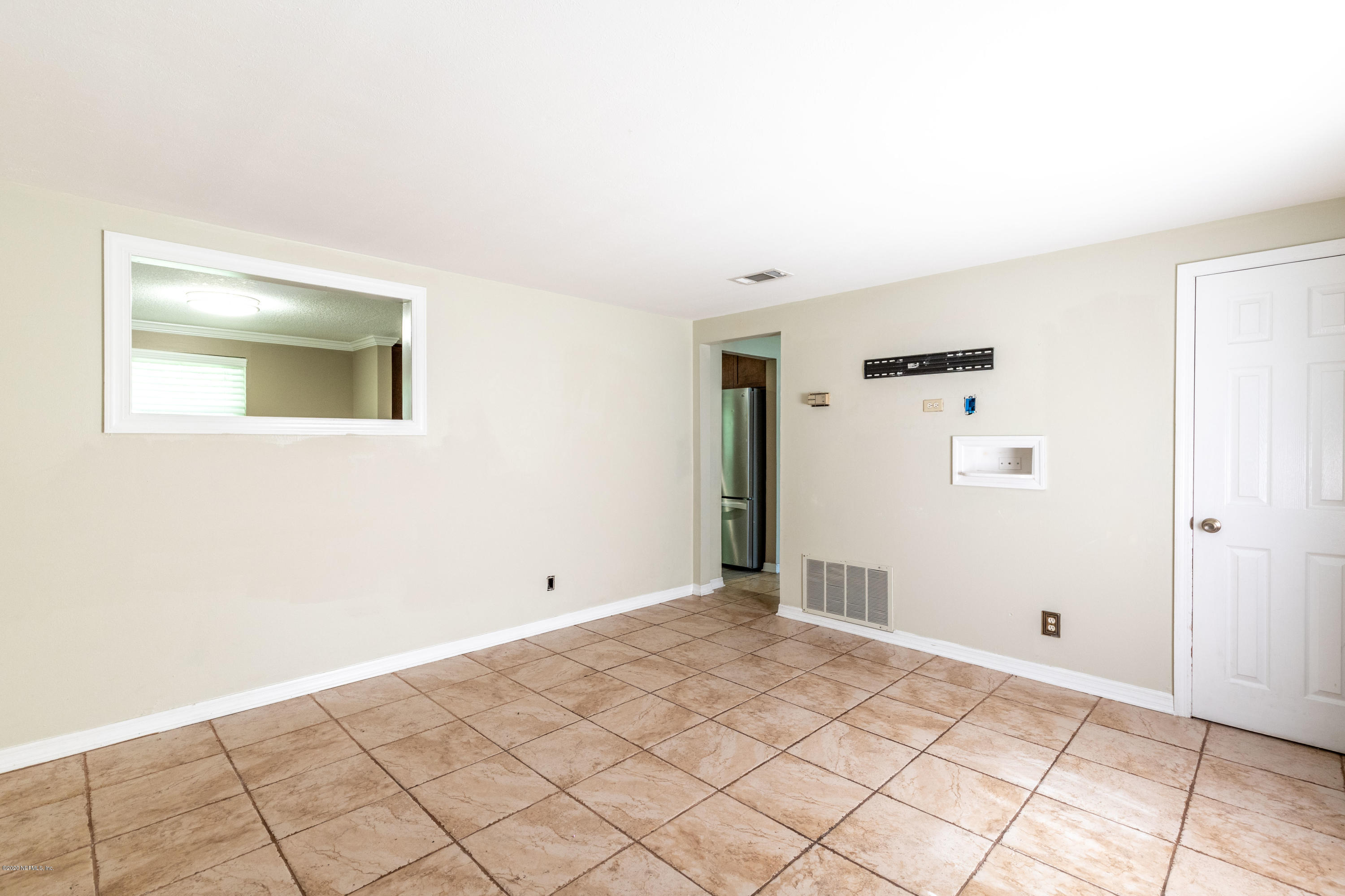 5908 Ensenada Road Jacksonville, FL 32244 - Photo 5 of 30 a view of an empty room