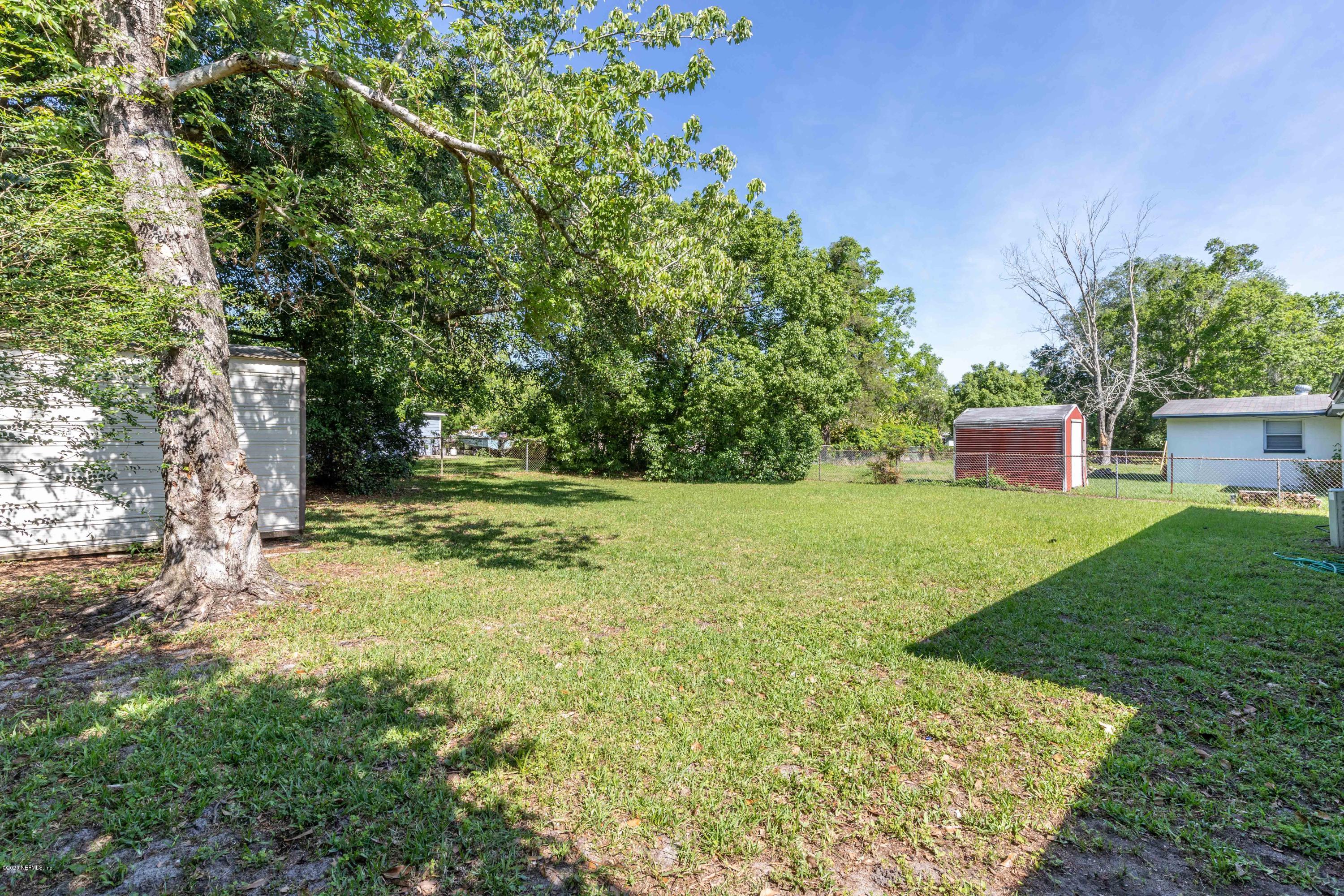 5908 Ensenada Road Jacksonville, FL 32244 - Photo 8 of 30 a view of a house with a yard