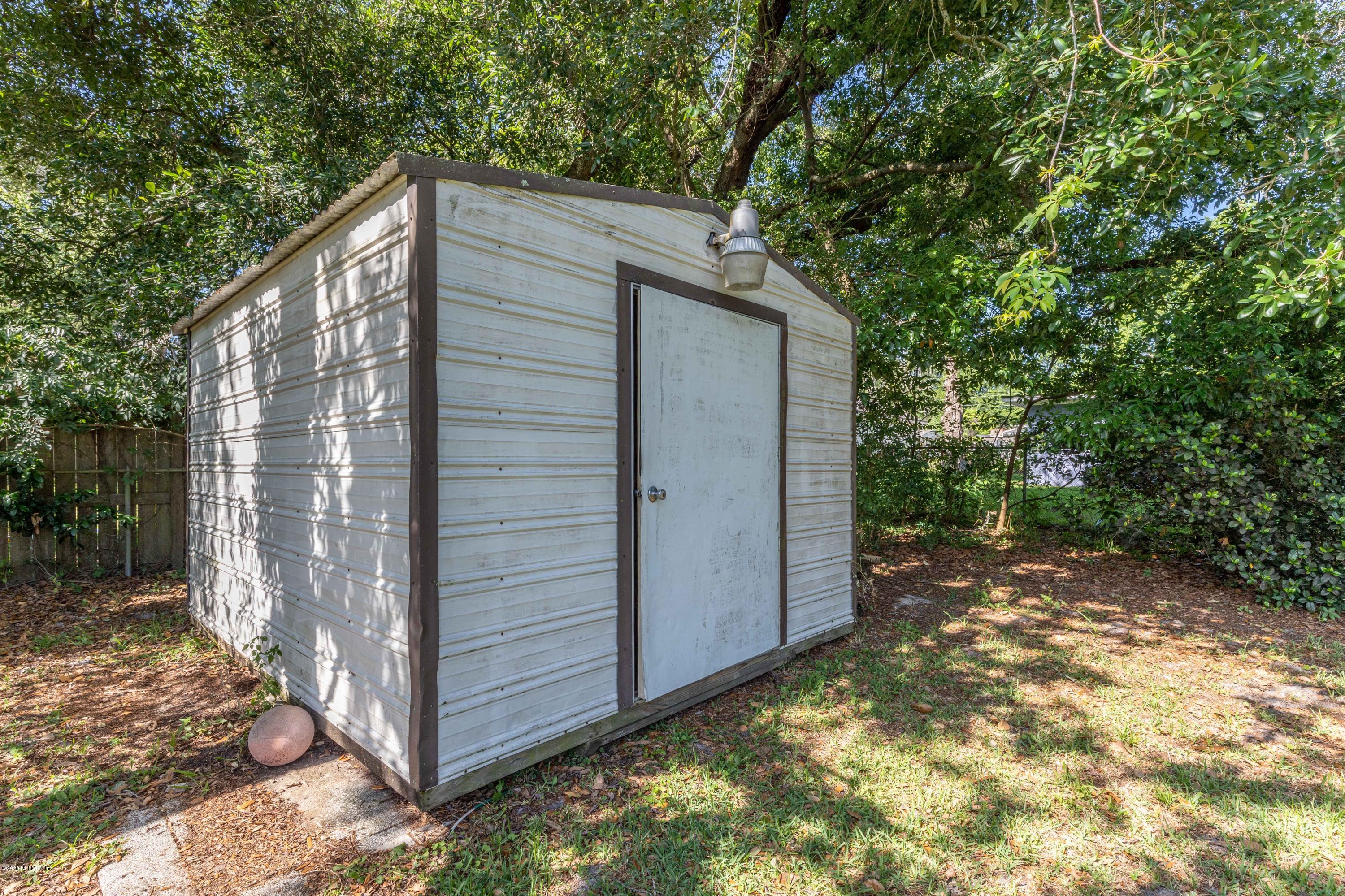 5908 Ensenada Road Jacksonville, FL 32244 - Photo 10 of 30 a backyard of a house