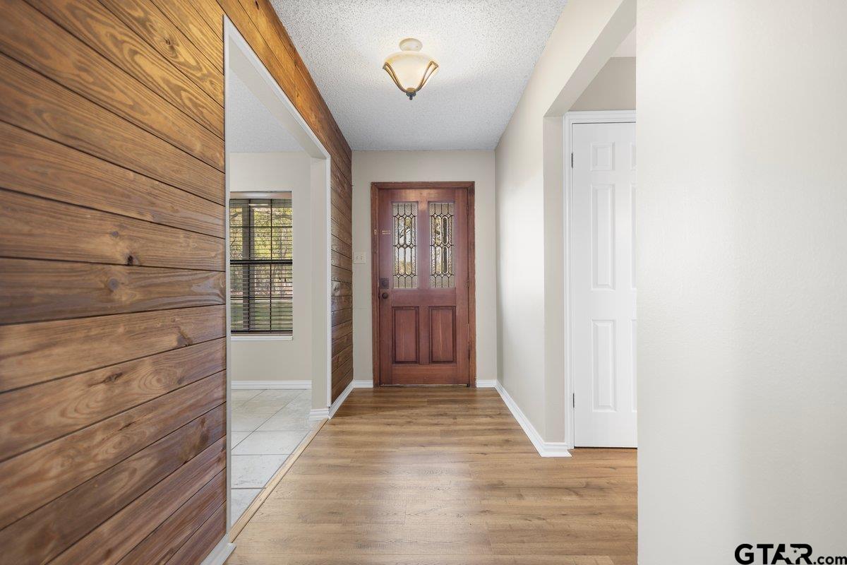 15938 Big Oak Bay Road Tyler, TX 75707 - Photo 17 of 21 a view of hallway with wooden floor