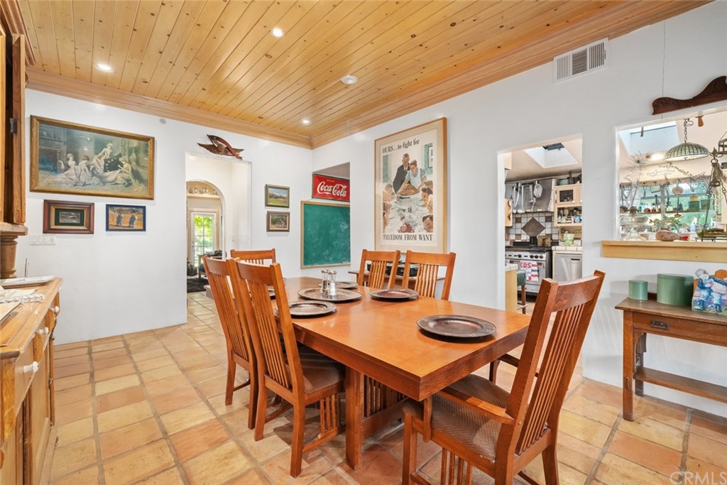 4124 North Ryan Road Creston, CA 93432 - Photo 16 of 75 a dining room with furniture a large window and a potted plant