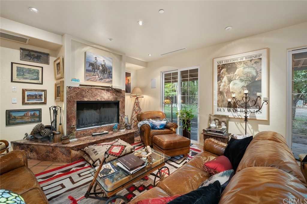 4124 North Ryan Road Creston, CA 93432 - Photo 5 of 75 a living room with furniture a large window and a fireplace