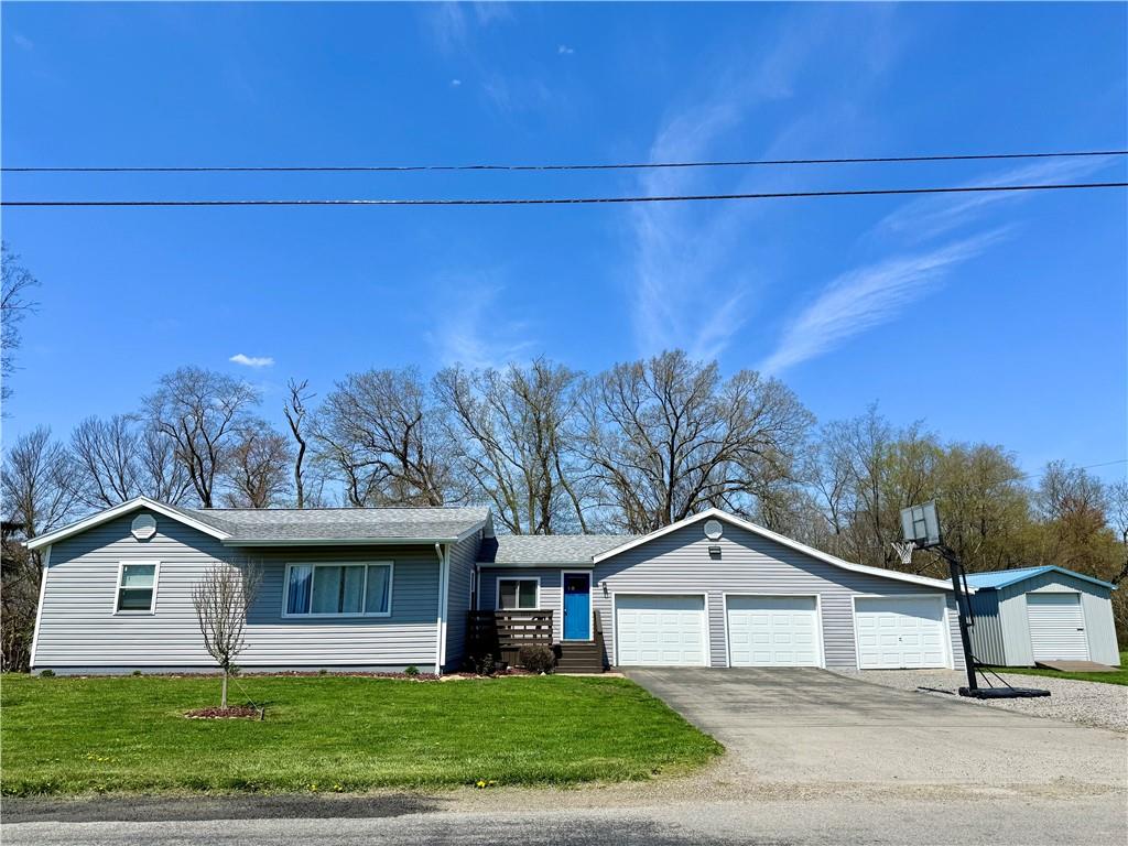 2459 Doc Walker Road Parker, PA 16049 - Photo 1 of 18 a view of a house with a yard