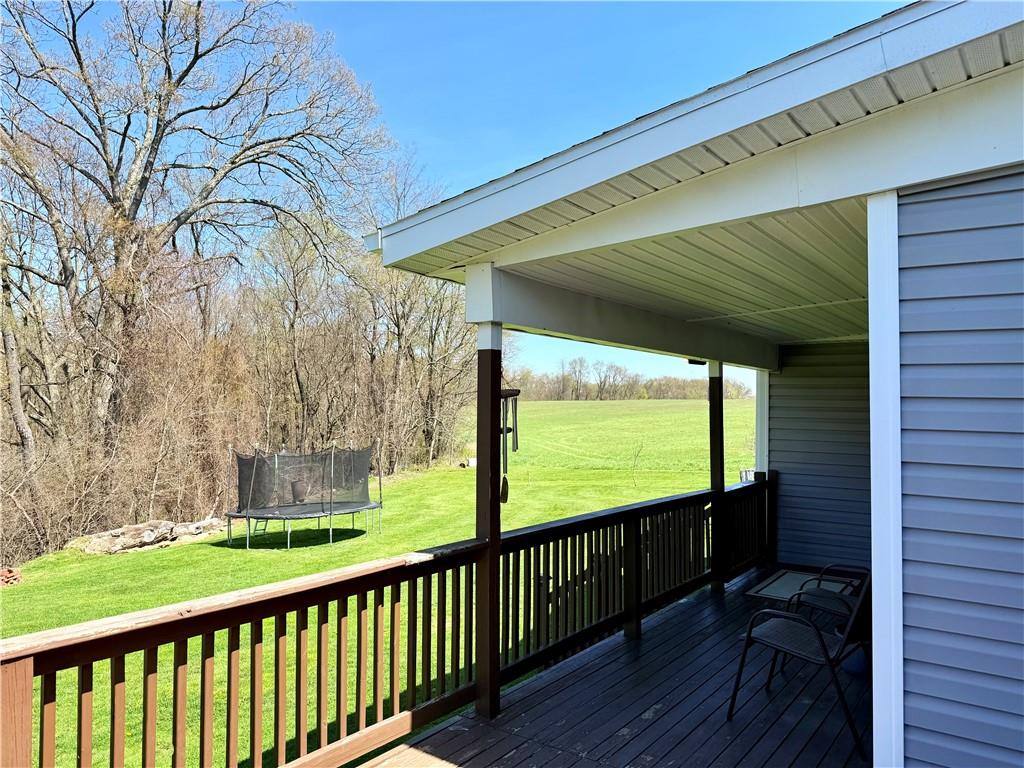 2459 Doc Walker Road Parker, PA 16049 - Photo 16 of 18 a view of a room with large trees and wooden fence