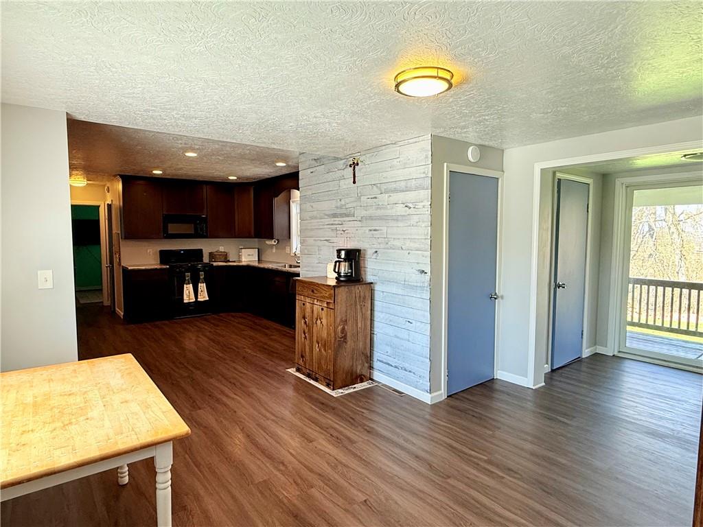 2459 Doc Walker Road Parker, PA 16049 - Photo 2 of 18 a view of kitchen with furniture and wooden floor
