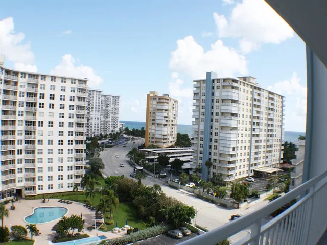 a view of a city with tall buildings