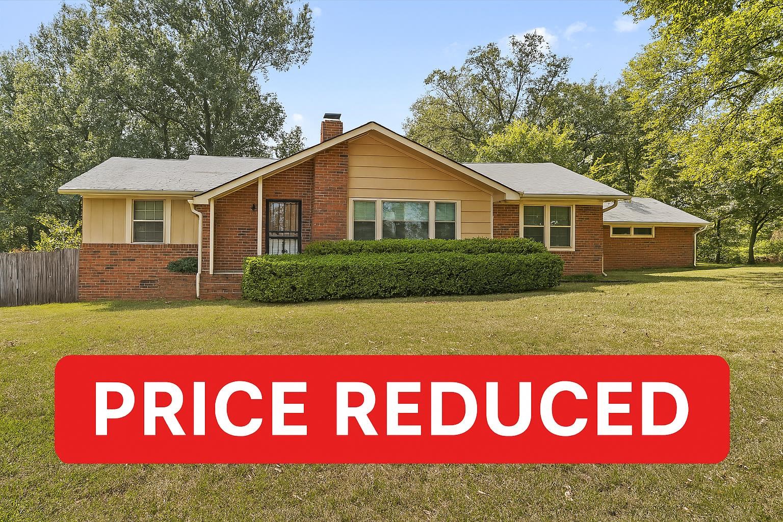 a sign that is sitting in front of a house