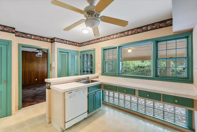 a view of a bathroom with a large window